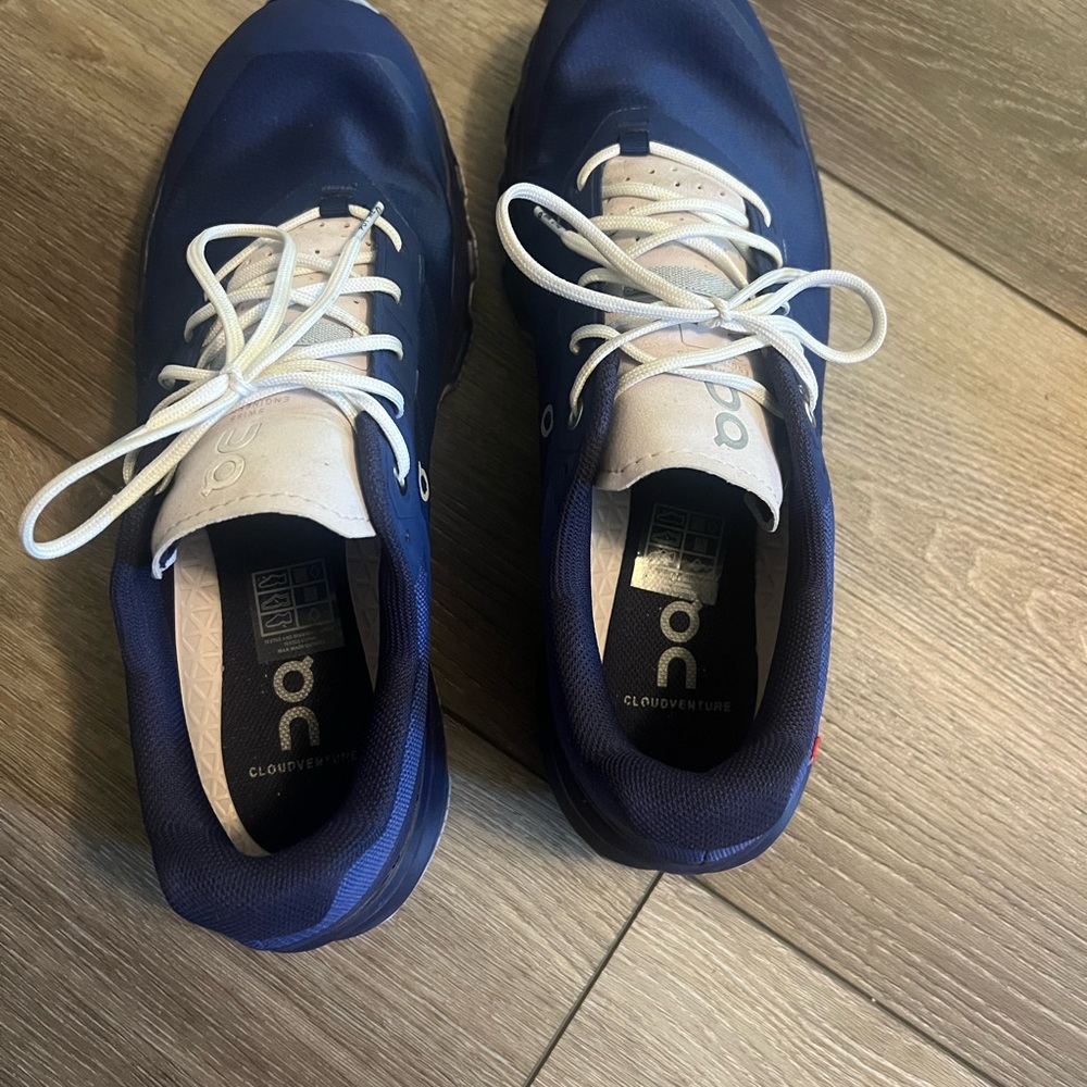 On Running Blue and White Athletic Shoes with Fabric Upper